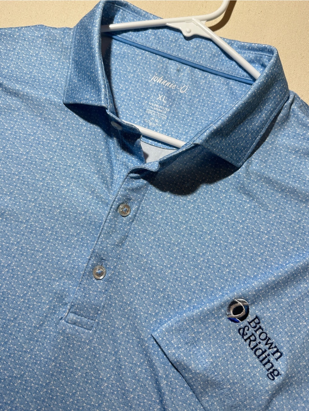Johnnie-O Light Blue Performance Golf Polo with embroidered corporate logo